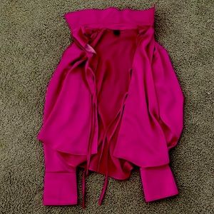 Pink blouse. Ties in the front.